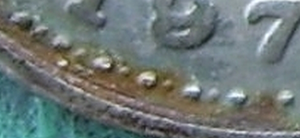 Rusted-Colombian-1971-20-Cents-Coin-With-?