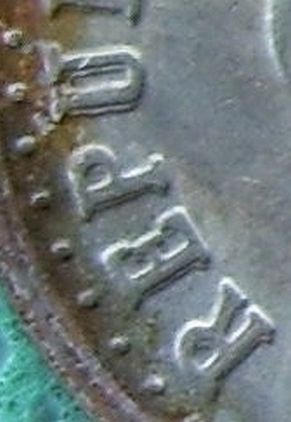 Rusted-Colombian-1971-20-Cents-Coin-With-?