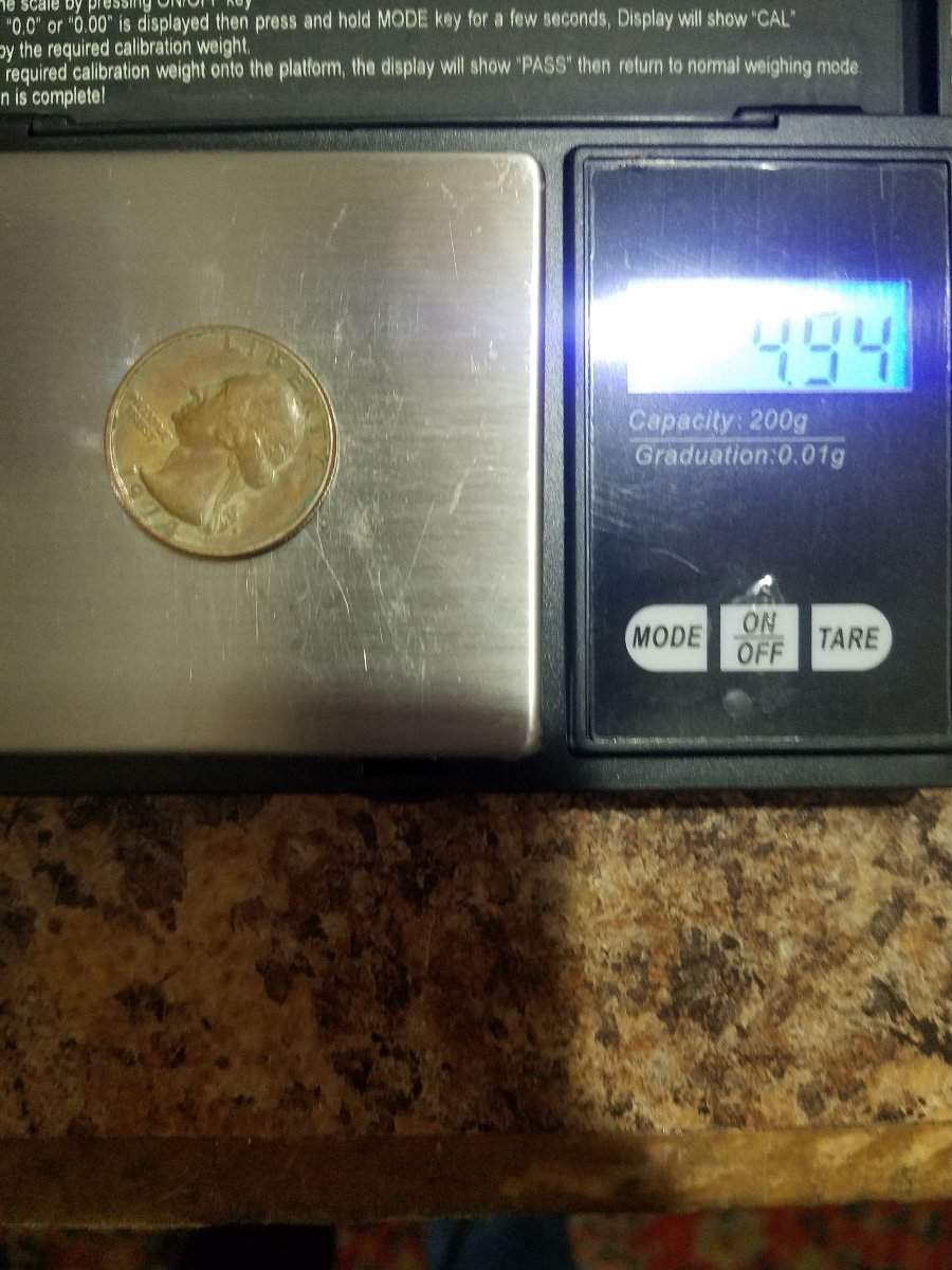 This-1974-Quarter-Has-Me-Guessing