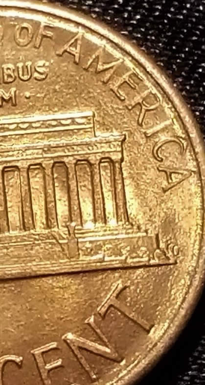 Strange--Fg-Stamp-Looks-Slanted-1987-D-Lincoln-Cent