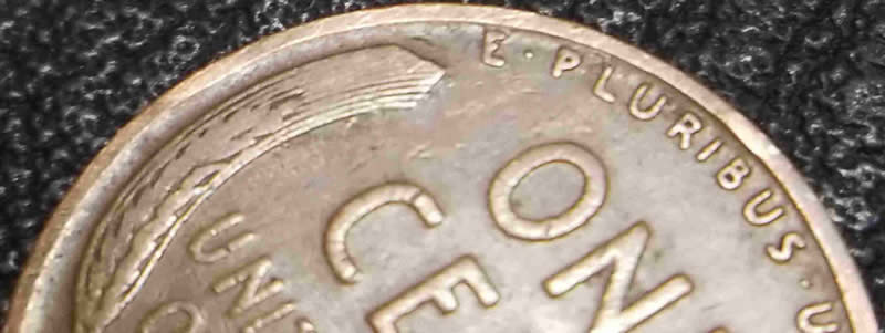 1934-D-Wheat-Penny,-Odd-Bowtie,-Missing-Area-In-Armpit,-And-T-In-Cent-Shado