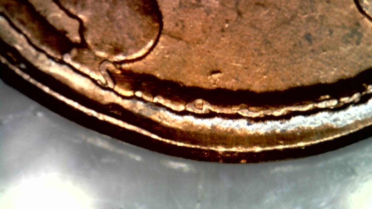 Please-Help-Identify-This-Unknown-Coin-I-Got-From-Bank-Roll-Of-Pennies