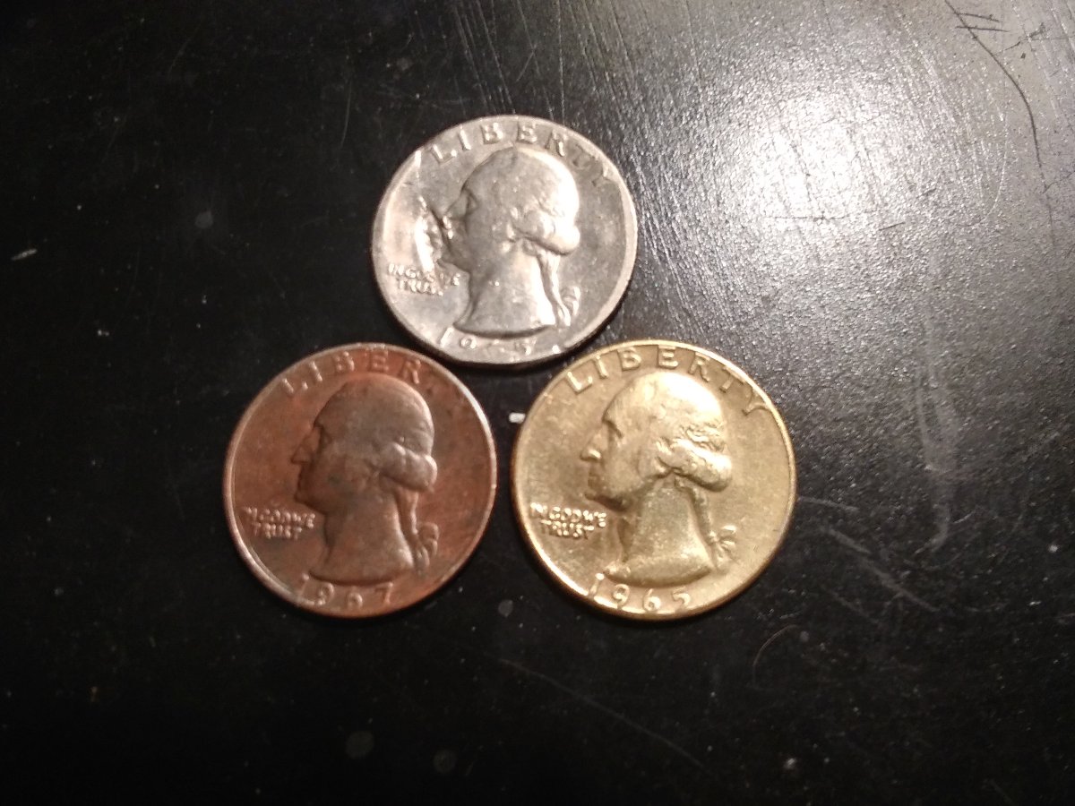 I-Have-2-1965-Quarters-1-Is-Gold-In-Color-And-One-Looks-To-Have-2-Chins