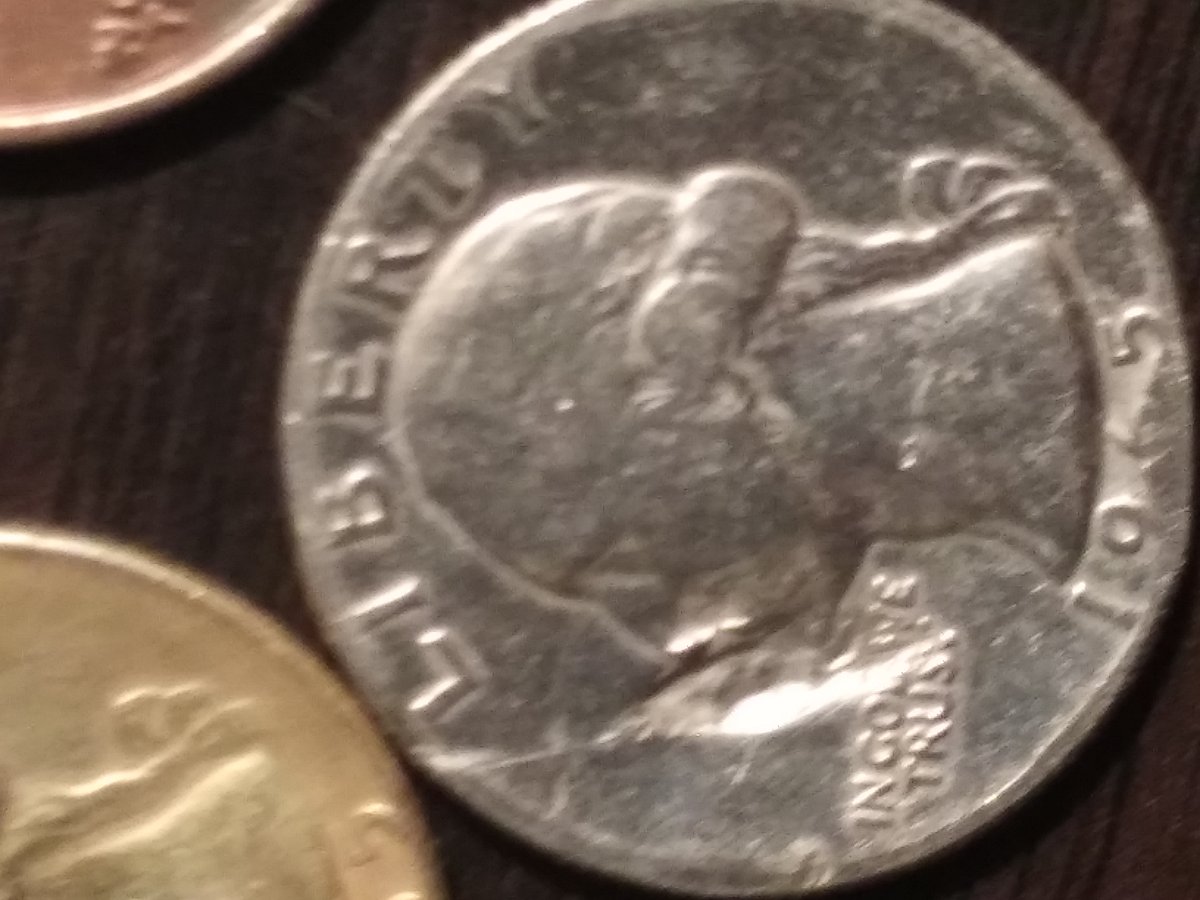 I-Have-2-1965-Quarters-1-Is-Gold-In-Color-And-One-Looks-To-Have-2-Chins