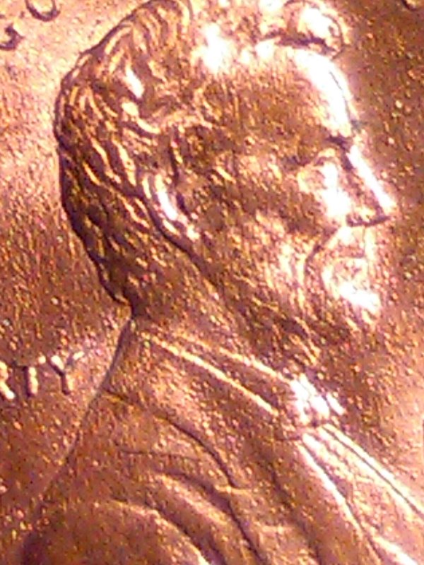 1987-D-Penny-Has-Metal-Bumps-All-Over-It-Both-Sides-?