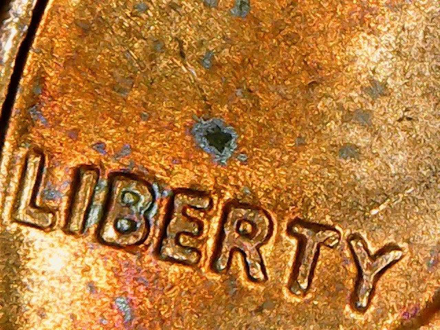 Can-Someone-Tell-Me-What-These-Marks-Are-Called-On-My-1975-D-Lincoln-Cent?