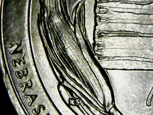 2015-P-Homestead--Quarter-That-Has-A-Unique-Mark-On-Its-Reverse....-DDR?