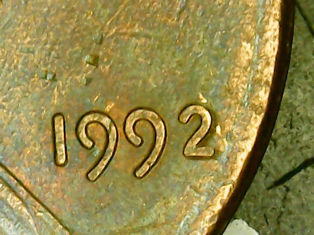Can-Someone-Tell-Me-How-The-MD-Occurred-On-The-Date-Of-This-1992-Penny?