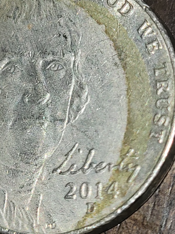 2014-Nickle-Shading-Or-Strike-Error?