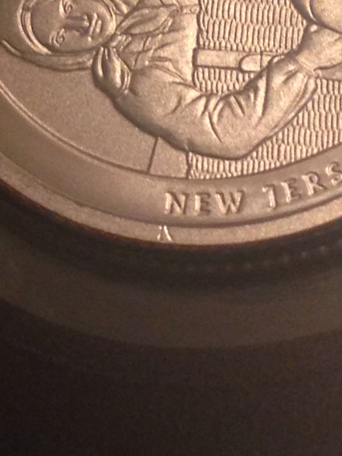 2017-Enhanced-Uncirculated-Set---Ellis-Island-Quarter-Possible-Error?