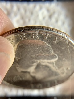1977-D-Quarter-Error-Or-Damage?