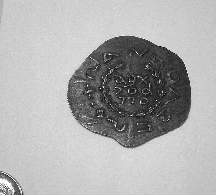 A-Strange-One-|-Anna-Eva-Fay-Magician's-Coin