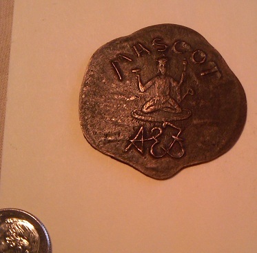 A-Strange-One-|-Anna-Eva-Fay-Magician's-Coin