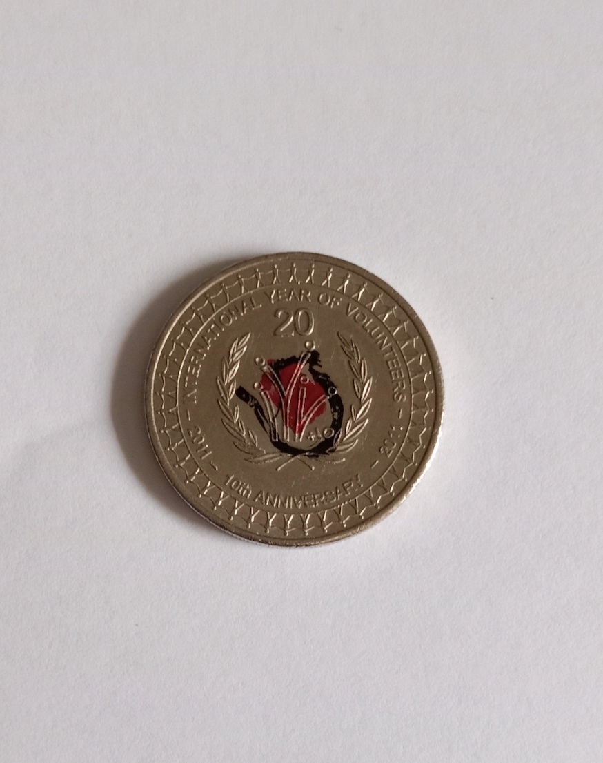 2011-Australian-20c-International-Year-Of-Volunteers-Coin-With-Odd-Ink-Marks.-Is-It-Real?