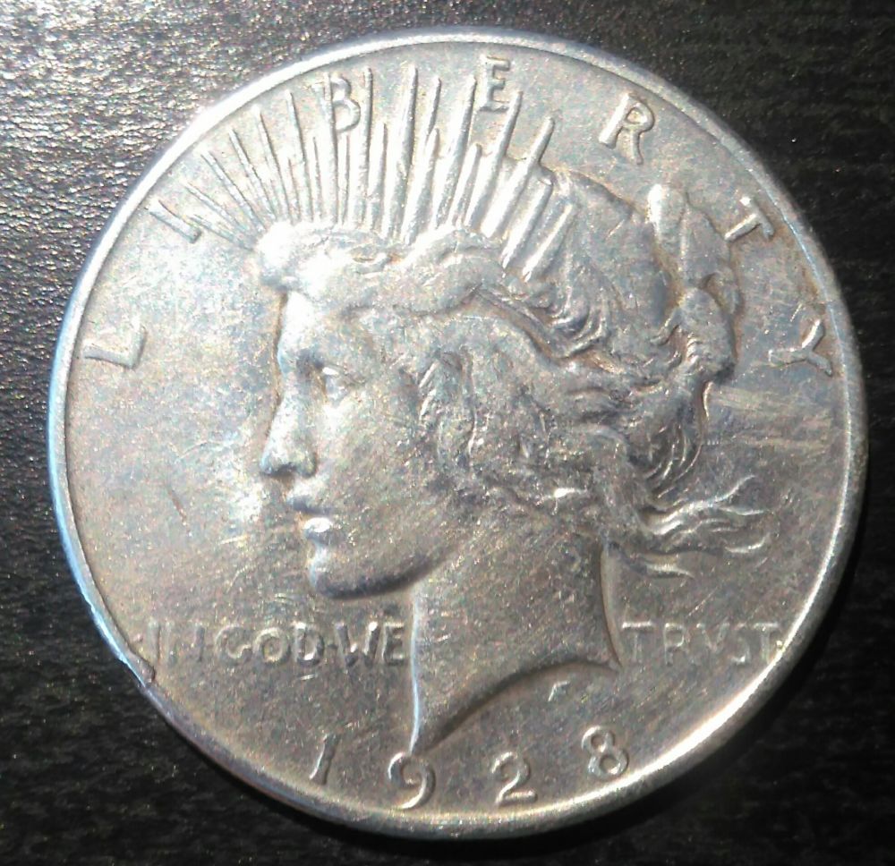 Peace-Dollar-1928---Surely-S?