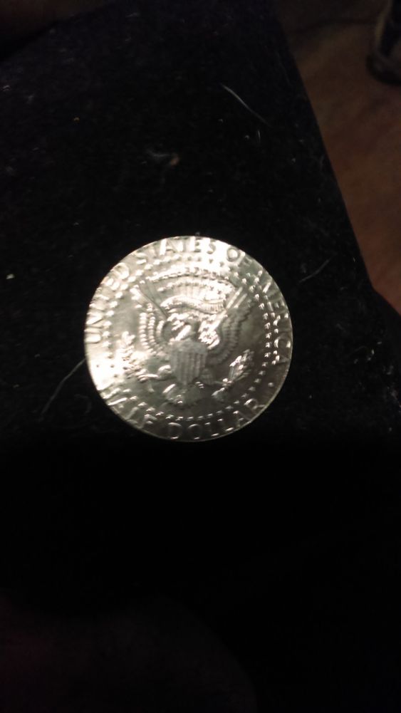 Half-Dollar-Out-Of-Bank-Box-Is-A-Half
