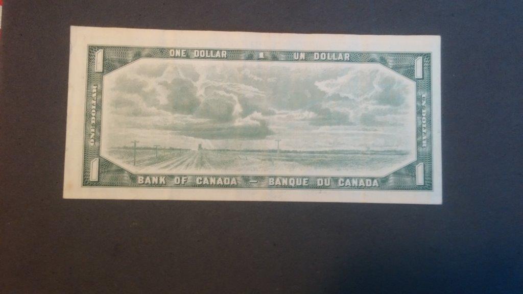 Unevenly-Cut-Or-Misaligned-Printing--$1-Bill-Question