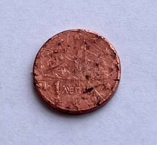 Greece-1-Euro-Cent-2007-Mint-Error-Or-A-Damaged-Coin?
