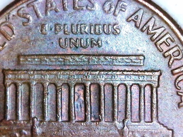 A-Couple-1969-D-Lincoln-Floating-Roof-Cents