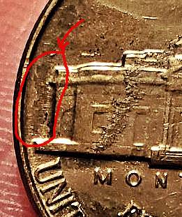 Unidentified-Schmutz-On-My-1959-Jefferson-Nickel