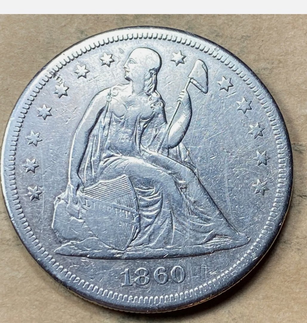 1860-O-Seated-Liberty-Dollar-Grade