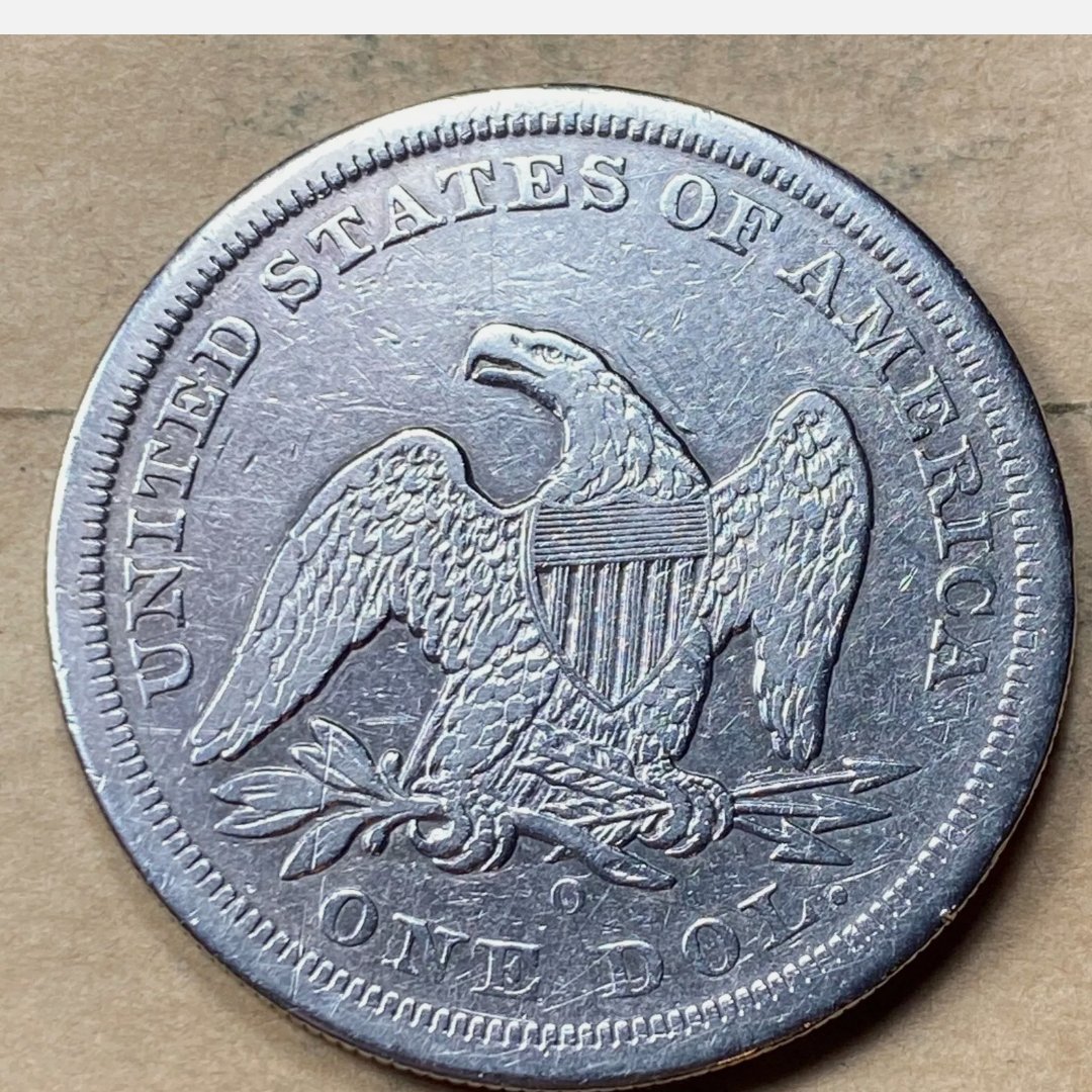 1860-O-Seated-Liberty-Dollar-Grade