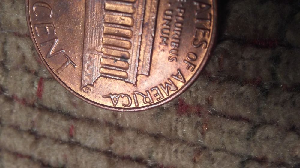 1982-Lincoln-Cent-Extra-Metal-Globs--On-Letters-Of-Reverse-?