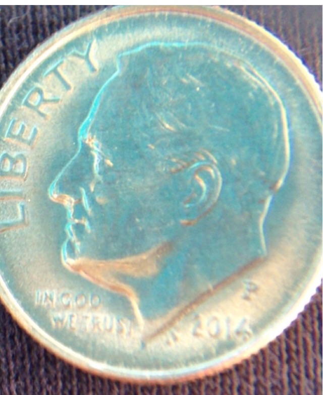 Trying-To-Figure-Out-What's-Happening-With-This-2014-Dime?