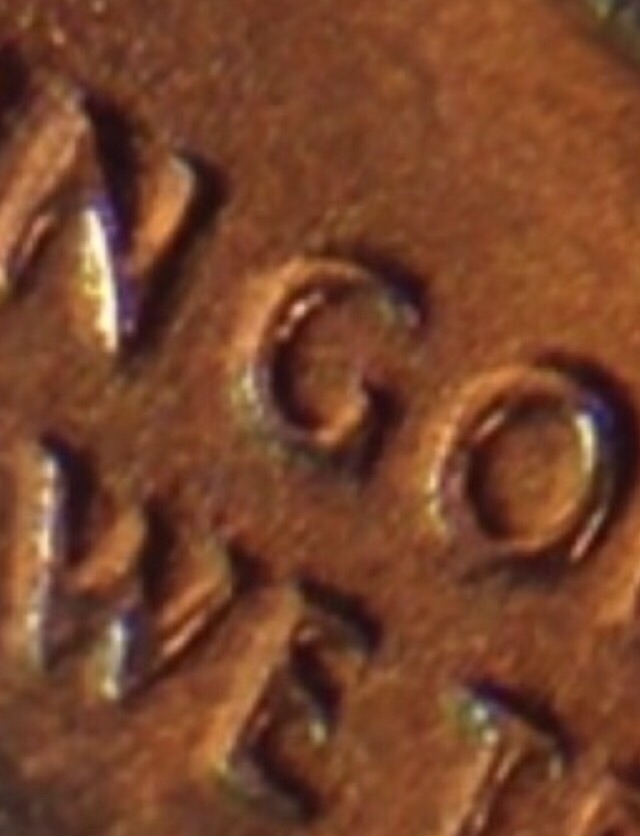 Trying-To-Figure-Out-What's-Happening-With-This-2014-Dime?