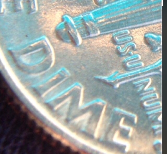Trying-To-Figure-Out-What's-Happening-With-This-2014-Dime?