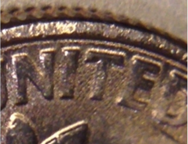 Trying-To-Figure-Out-What's-Happening-With-This-2014-Dime?