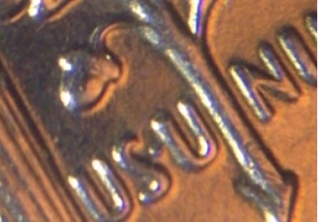 Trying-To-Figure-Out-What's-Happening-With-This-2014-Dime?