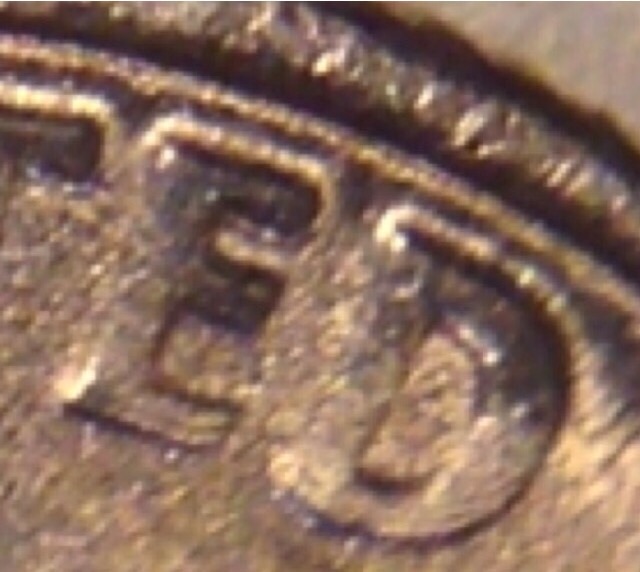 Trying-To-Figure-Out-What's-Happening-With-This-2014-Dime?