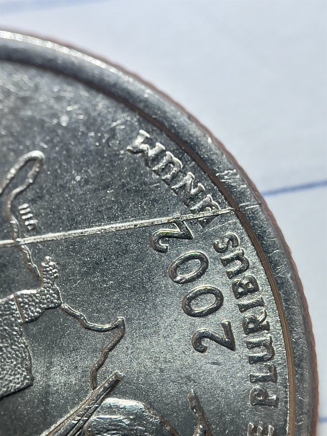 2002-D-Louisiana-Quarter---Weird-Line