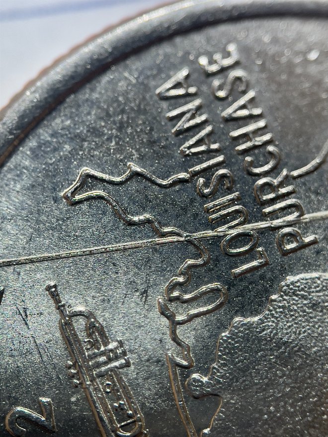 2002-D-Louisiana-Quarter---Weird-Line