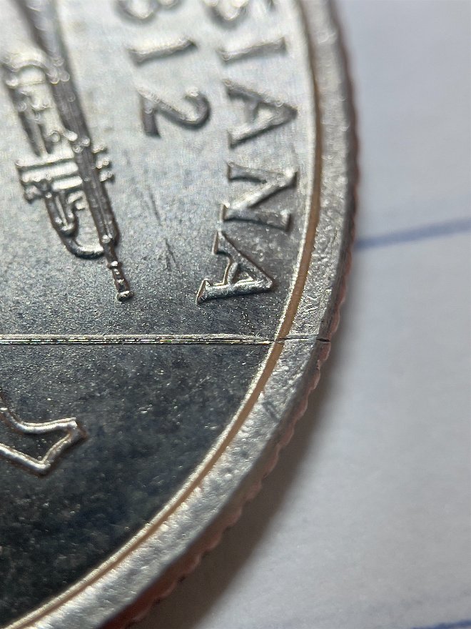 2002-D-Louisiana-Quarter---Weird-Line