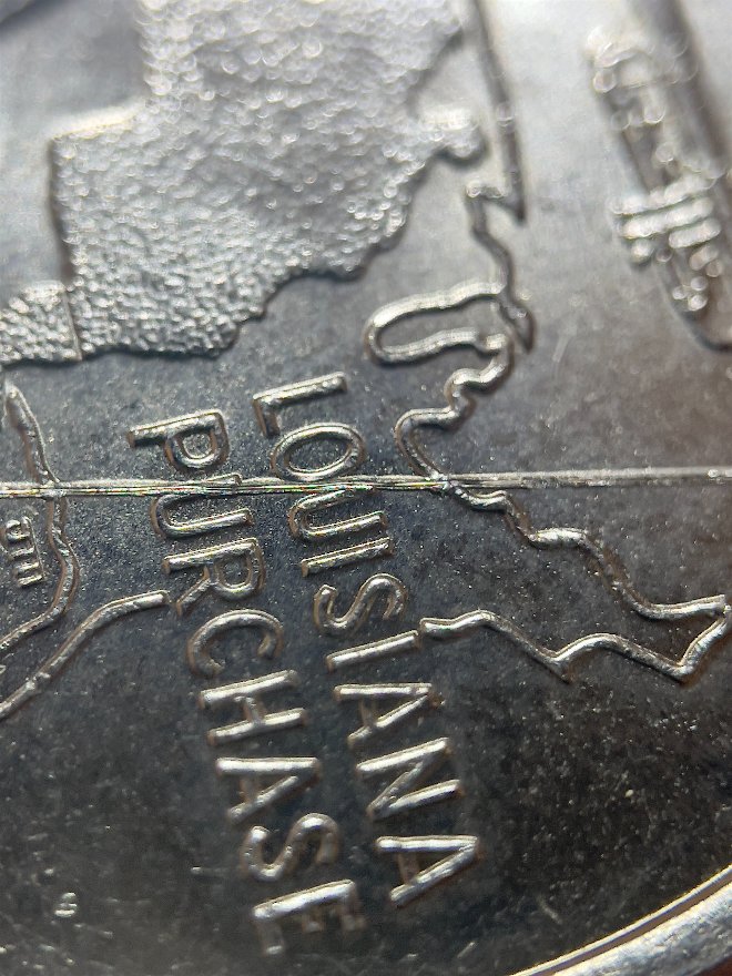 2002-D-Louisiana-Quarter---Weird-Line