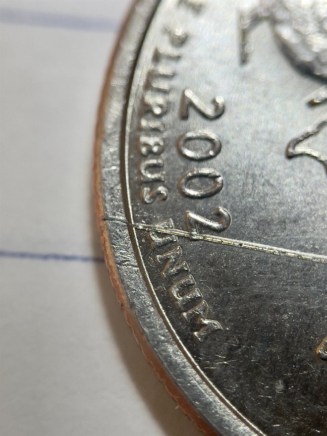 2002-D-Louisiana-Quarter---Weird-Line