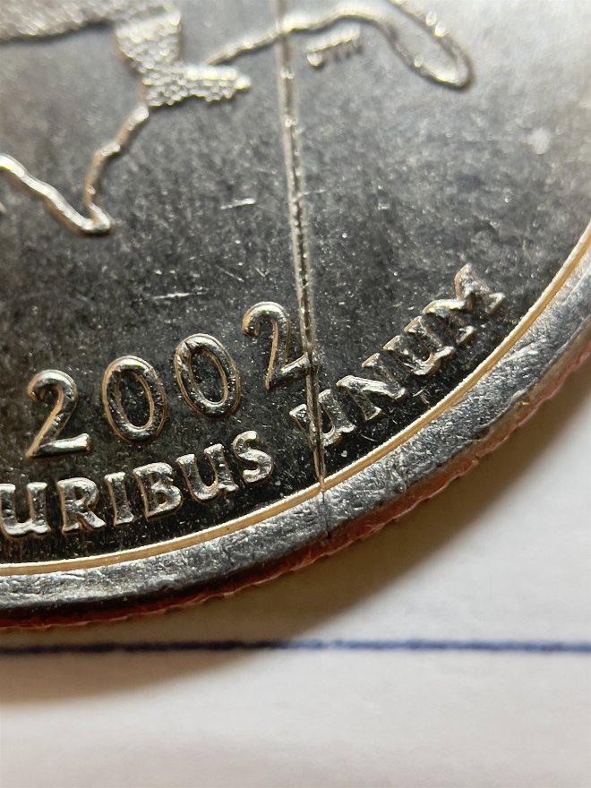 2002-D-Louisiana-Quarter---Weird-Line