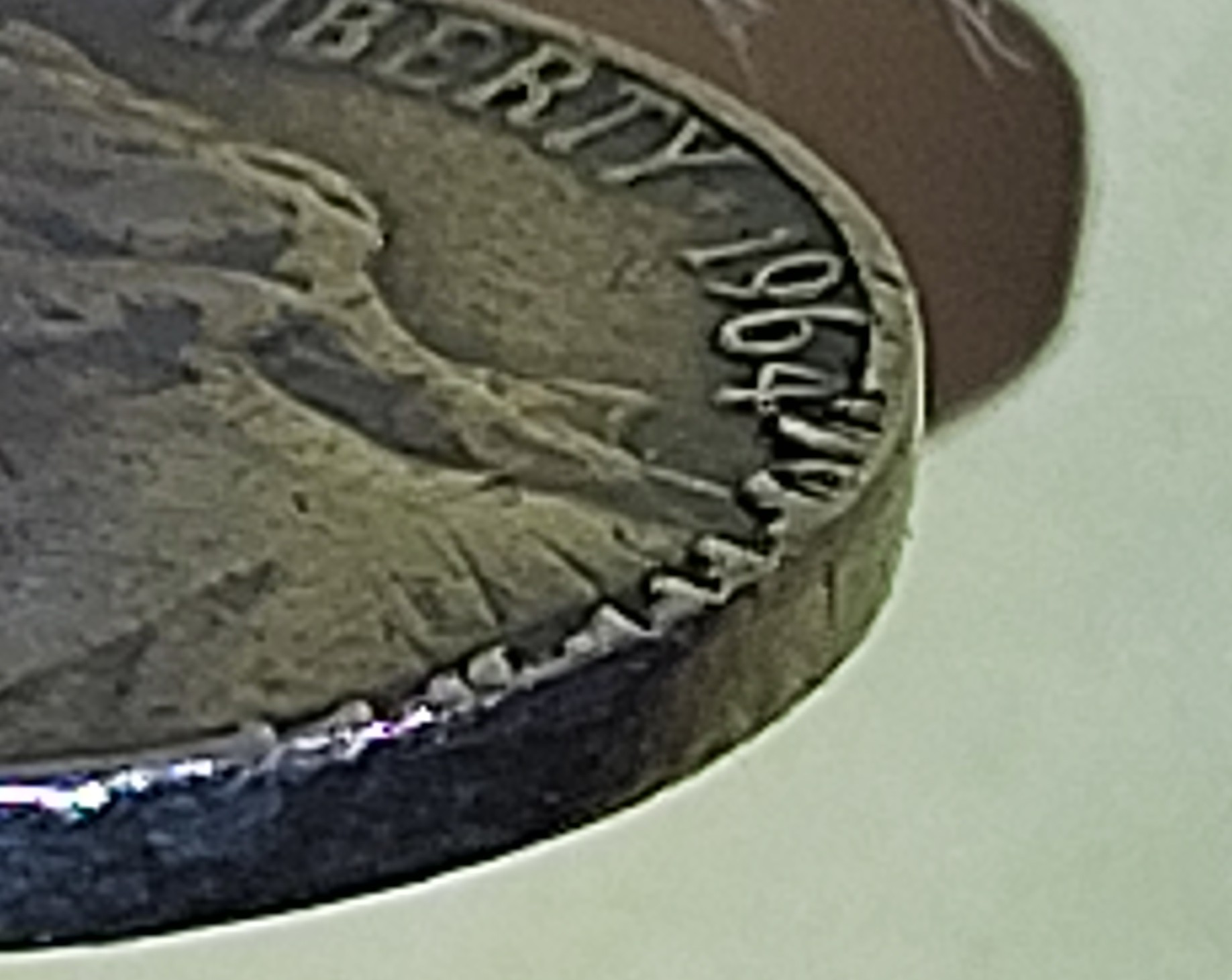 Help-Me!-I-Found-A-64-Jefferson-No-Mint-Mark-With-An-Odd-Edge,