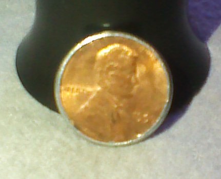 Can-Someone-Help-Me-Out-With-This-1990-Penny-With-A-Silver-Like-Edge.