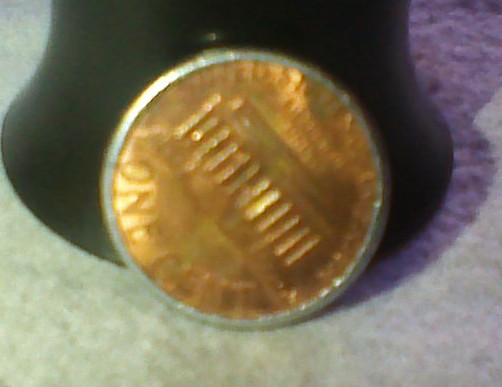 Can-Someone-Help-Me-Out-With-This-1990-Penny-With-A-Silver-Like-Edge.