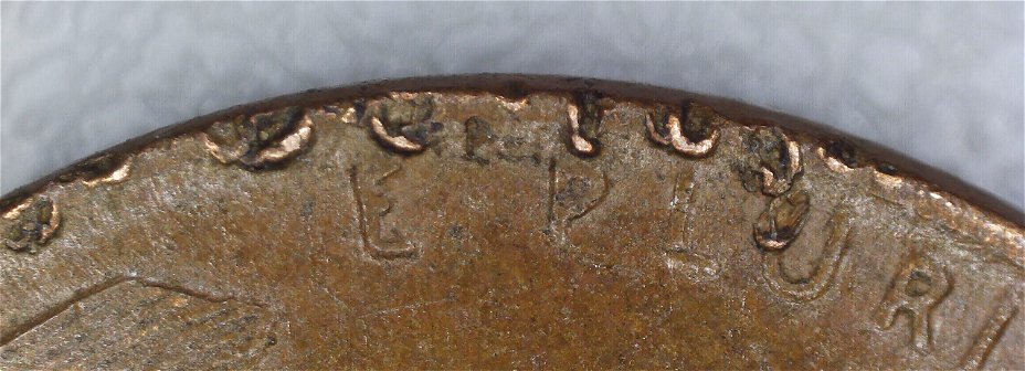 1952-Penny-Error-Looks-Like-All-Lettering-Stamped-On-Side/Edge=help