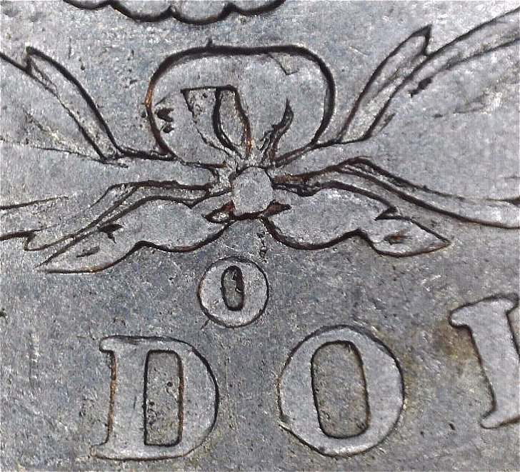 1889---O-Morgan-With-What-Looks-Like-A-Backwards-C-In-The-O-Mint-Stamp-Help
