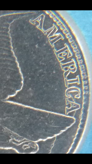 1858/7-Eagle-Clashed-With-20?-Gold?-Interesting-Coin-Here