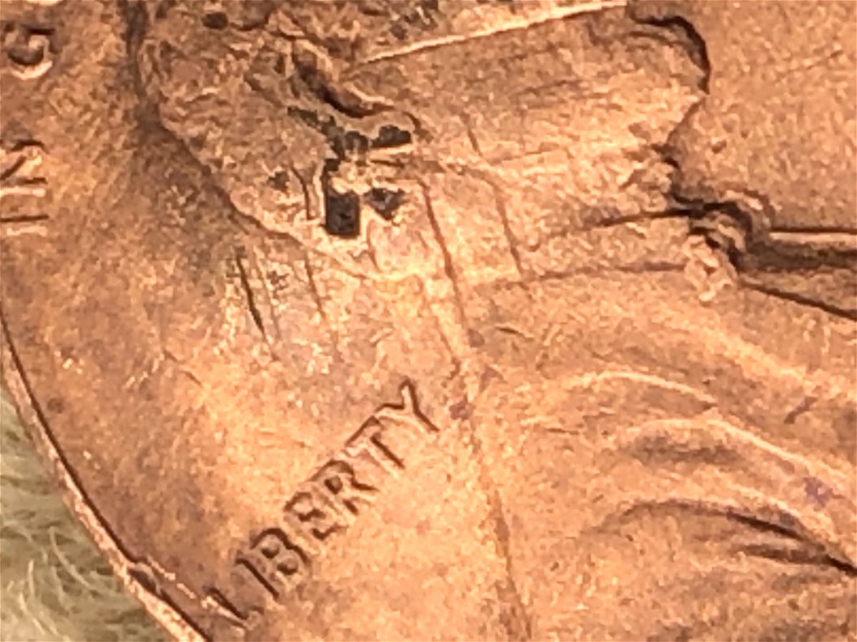 1984-Penny-With-Damage-And-Imprint