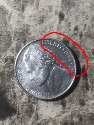 1994-D-Nickel-Weird-Ring-Error-Or-?