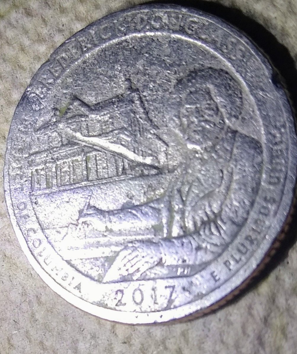 2017-D-Fredrick-Douglass-Quarter-With-Catastrophic-Errors