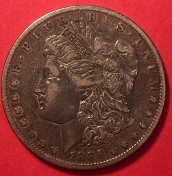 Very-Worn-1886-O-Morgan-Dollar