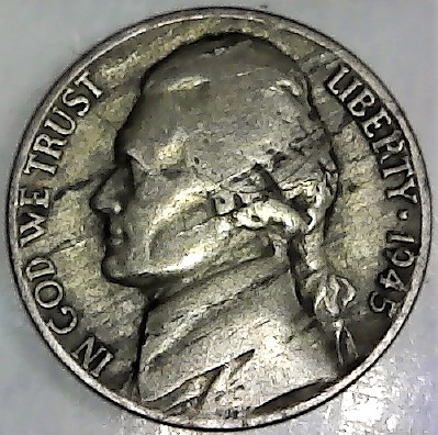 Here's-A-1945-P-Nickel-With-A-Few-Things-Going-On